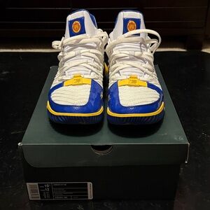 This is a Nike LeBron 16 "SuperBron" sneaker